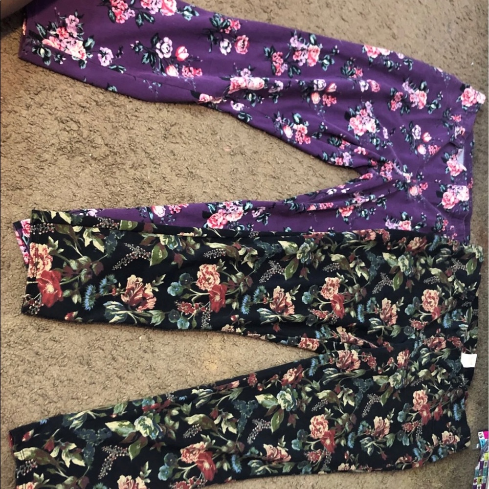 2 pairs of floral pants.